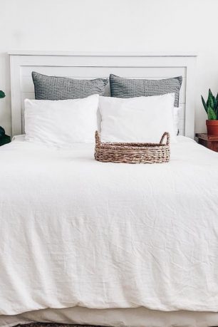 a bed with a blanket made by coyuchi